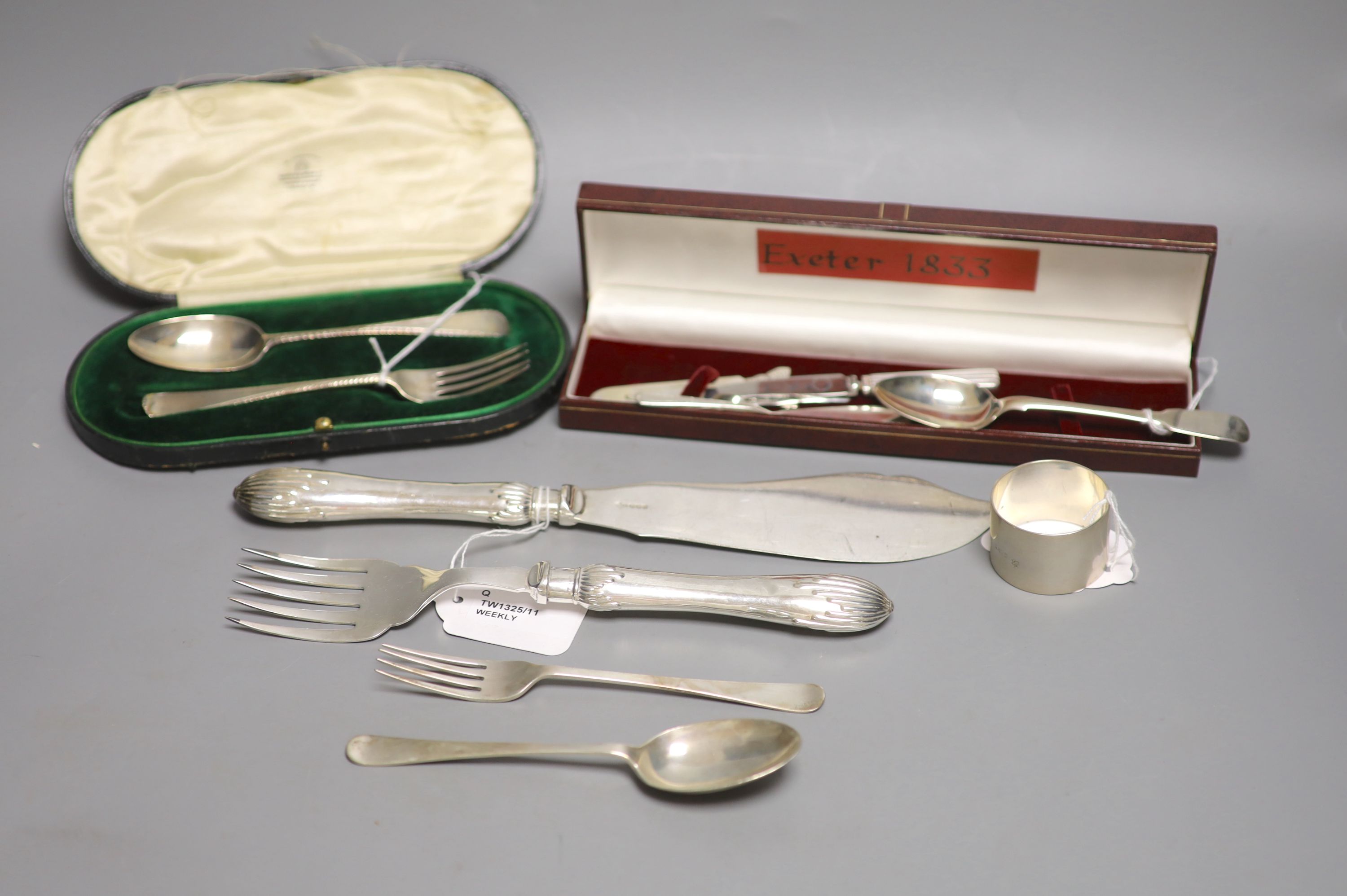 A small collection of silver and plated flatware,